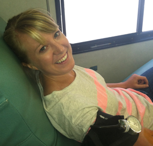 Erin gives blood.